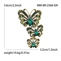 Broche papillon vintage dorée avec strass verts pour manteaux et tailleurs 5,6cm - Vert