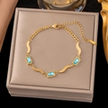 Gold-plated titanium steel bracelet featuring sky blue rectangular gemstones and wave links - 【sle2039】three Blue Square Diamond Bracelet Gold