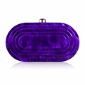 Detailed macro view of purple marble acrylic evening bag with gold clasp and gemstone - Purple