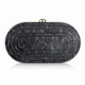 Detail of dark grey marble pattern acrylic clutch bag with golden metal clasp closure - Black