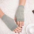 Light sage green knitted fingerless gloves for winter warmth and soft cozy style - One Size / Light Gray