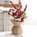 Mini artificial Christmas tree with red berries and burlap base, height 26cm, weight 36g - Apple Green Leaf