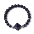 Detailed macro of matte black onyx beads and pyramid blue stone pendant on bracelet - Blue Sandstone Pyramid Matte Stone Bracelet