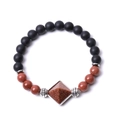 Detailed macro view of matte black agate beads and goldstone pyramid on the beaded bracelet - Gold Sandstone Pyramid Matte Stone Bracelet