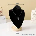 Medium black velvet bust jewelry stand with a natural wood base for necklace display - Black Velvet Medium