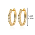 Macro shot of gold huggie earrings with cubic zirconia inlay and 1.6cm size measurement - G123434