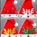 Christmas hats set with red, silver, gold, and green sequined reindeer antlers - Antler Santa Hat