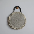 Circular woven straw crossbody bag with tassels and black handle in beige black patterns - With Lining / Black