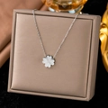 Elegant silver titanium steel four-leaf clover heart necklace in a gold display box - XLH1118 Four Hearts / Steel