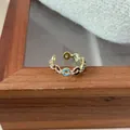 Retro golden open ring featuring red and blue enamel flower with clear crystals - Enamel Painted Rhinestone Donut Ring