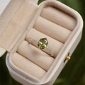 Exquisite silver ring with an olive green oval stone and side diamonds in a jewelry box - Olive Green Oval Single Rhinestone Open Ring