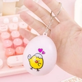 Pink egg-shaped virtual electronic pet keychain featuring a cute cartoon chicken design - Egg Shell Flip/Pink
