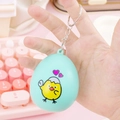 Mint green electronic pet keychain with cartoon chick pattern on a egg-shaped device - Egg Shell Flip/Green