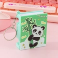 Mini green book keychain with panda design and level score tracker function - Book Shape Flip/Green