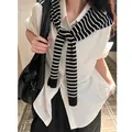 Classic black and white striped knitted shawl draped over a white short-sleeve shirt - Black Base Stripe (Large)