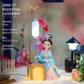 Ancient style girl figurine with cyan Hanfu holding a brush and hanging lantern lamp - Painting Under Lamp (1060-37)