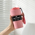 Detailed view of pink insulated sports bottle with fabric strap and diamond texture - 510ml / Standard Style - Pink