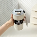 Detail of smart LED temperature display on cream stainless steel thermos with carry strap - Smart Model - White