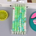 Set of 6 retractable green pens with dinosaur cartoon patterns in transparent pouch - New Dinosaur