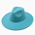 Close-up of a teal wool fedora hat with wide flat brim and classic pinched crown design - One Size / Lake Blue