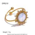 Detail of 18K gold-plated sunflower ring with opal stone and cubic zirconia accents - Star Flare Open Ring (DFR210)