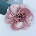 Detailed view of the 14cm 3D satin rose brooch with elegant layers in soft dusty pink - Dusty Pink