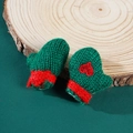 Close-up of green knitted Christmas mini gloves with red fur trim and heart embroidery - Green Knitted Gloves with Red Heart / 5cmx4cm