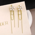 Close-up of elegant long tassel earrings with pearl flower studs and gold-plated fine chains - Artificial Pearl Flower Gold Tassel