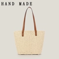 Minimalistische beige Korbtasche aus Papierseil mit braunen Ledergriffen für Sommer - Beige