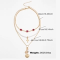 Three-layer gold necklace with pink gems, pearl cross, and heart pendant detailing - Cross Pearl Style / Pearl Multi-layered Style (DNXN04003)