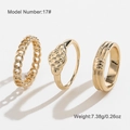 Three-piece gold metal ring set with Cuban chain, dot texture, and triple embossed patterns - Three-Piece Fashion Ring Set (WXR01079)