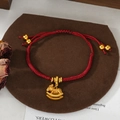 Detail of red braided lucky horse bracelet with gold-tone rocking horse charm and beads - Gold Texture Rocking Horse Adjustable Style (SL90325)