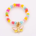 Detail of colorful beads elastic ring featuring a cute pink and yellow animal pendant - One Size / Butterfly Charm Style (NXR01553)