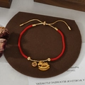 Red braided rope bracelet with golden rocking horse and coin charm for New Year - Rocking Horse Ruby Coin Style (SL90331)