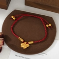 Handcrafted red string bracelet featuring a golden Chinese zodiac pig charm and beads - Carved Zodiac Pig Transfer Bead Style (SL90326)