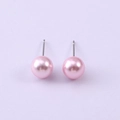Detailed close-up of elegant 8mm pink glass pearl stud earrings with polished finish - Pink (NCE07098-1-8MM)