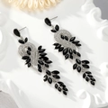 Macro detail of long silver drop earrings featuring black marquise stones and rhinestones - Black - Silver Base (Style 3)