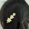 Elegant gold hair clip with triple star design featuring pearl-encrusted accents for women - White Pearl Three Star Side Clip (LLTS5263-1)