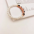 Handmade Baroque pearl bracelet with pink Evil Eye beads and gold rhinestone accents - Orange Red