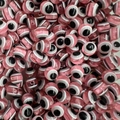 Macro detail of pink resin evil eye beads with polished finish for DIY jewelry making - Light Pink / 10mm
