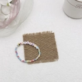 Bracelet de l'amitié Sisters coloré avec perles macaron et breloque œil jaune chance - Style Mauvais Œil Jaune SISTERS
