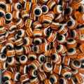 Close-up of orange evil eye glass beads for DIY necklaces and handmade bracelets - Orange / 10mm