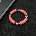 Evil eye bracelet with pink marble tubes and golden beads on a black background - Pink Marble Pattern (Style 3) / Pink