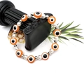 Bracciale elastico etnico con perline occhio del diavolo arancioni e perle bianche - Arancione