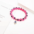 Pink evil eye beaded elastic bracelet with silver Hamsa hand charm and resin beads - Pink