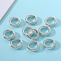 Set of 10 vintage silver alloy lucky charms with embossed Chinese characters for DIY crafts - As Shown
