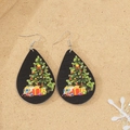 Detailed view of teardrop wood earrings featuring a festive Christmas tree and gifts - Christmas Tree and Gift Box (4)