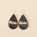 Detailed view of teardrop wood earrings with Santa and Merry Christmas print - Santa Claus (5)