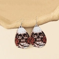 Close-up of teardrop faux leather earrings with gothic skull and red rose pattern - Style I