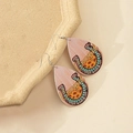 Detail of Western teardrop earrings with Cowgirl text and leopard print patterns - Style K